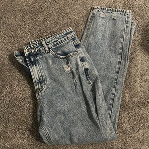 Ripped straight women jeans.